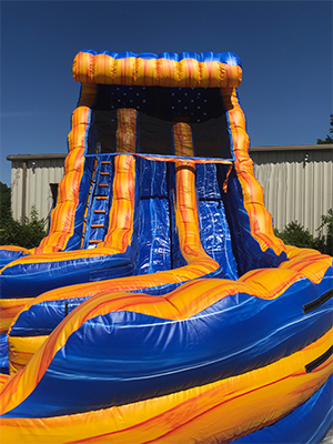 Front view of a 18' foot water slide design with a wave on at the top with blue color with orange trim.